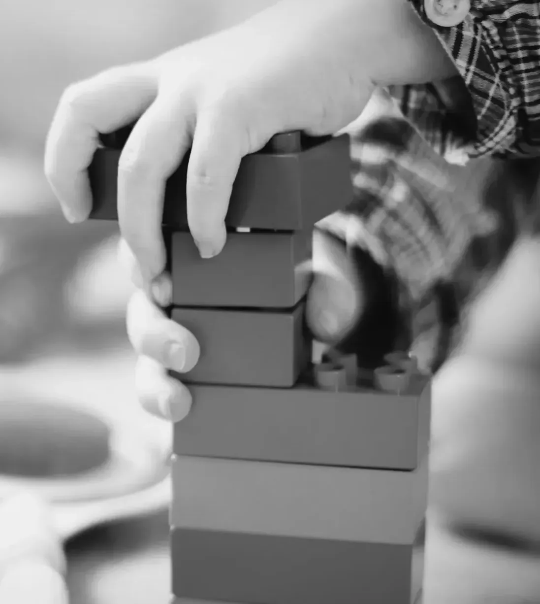 a-child-builds-from-blocks-selective-focus-2025-06-26-00-45-38-utc-bw-crop trauma counselling